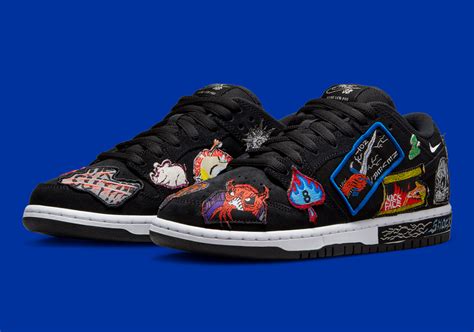 black Nike dunks with patches